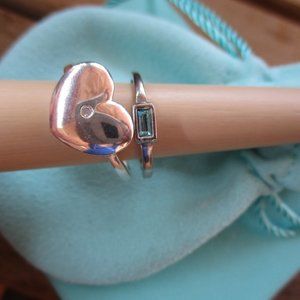 Sterling silver heart with small diamond in center